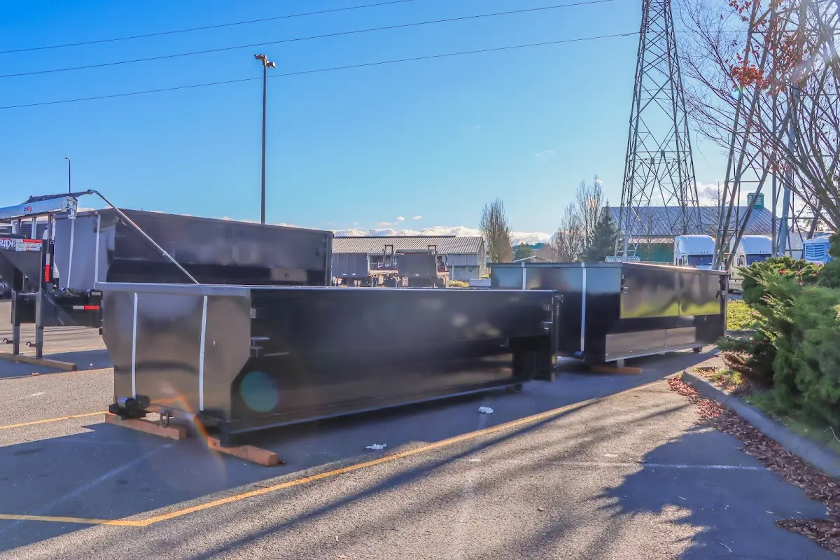 Roll-off dumpster ready for waste disposal at job site for Residential Dumpster Rental in Garner
